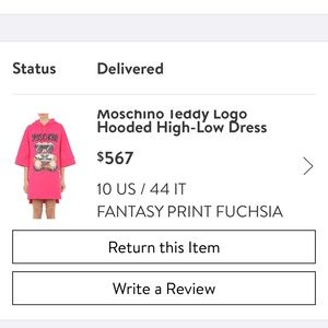 Moschino sweater dress . 1 year old . Worn twice .